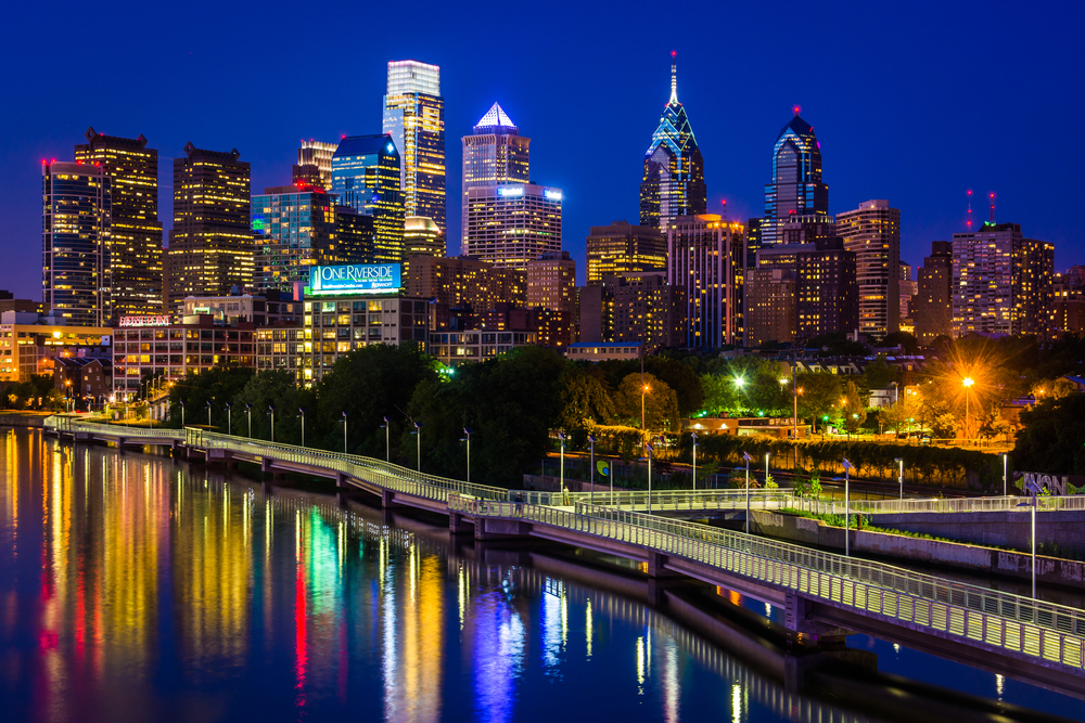 The Philadelphia skyline and Schuylkill River at night, seen from the South Street Bridge in Philadelphia, Pennsylvania. The Philadelphia skyline and Schuylkill River at night, seen from the South Street Bridge in Philadelphia, Pennsylvania.